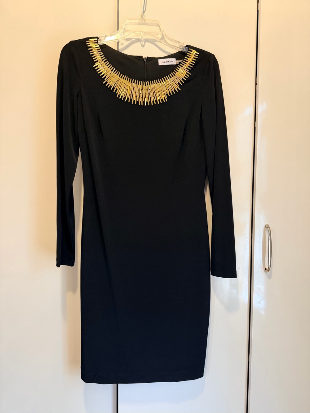 Calvin Klein Black Long Sleeve Sheath Dress with Gold Neck Accents